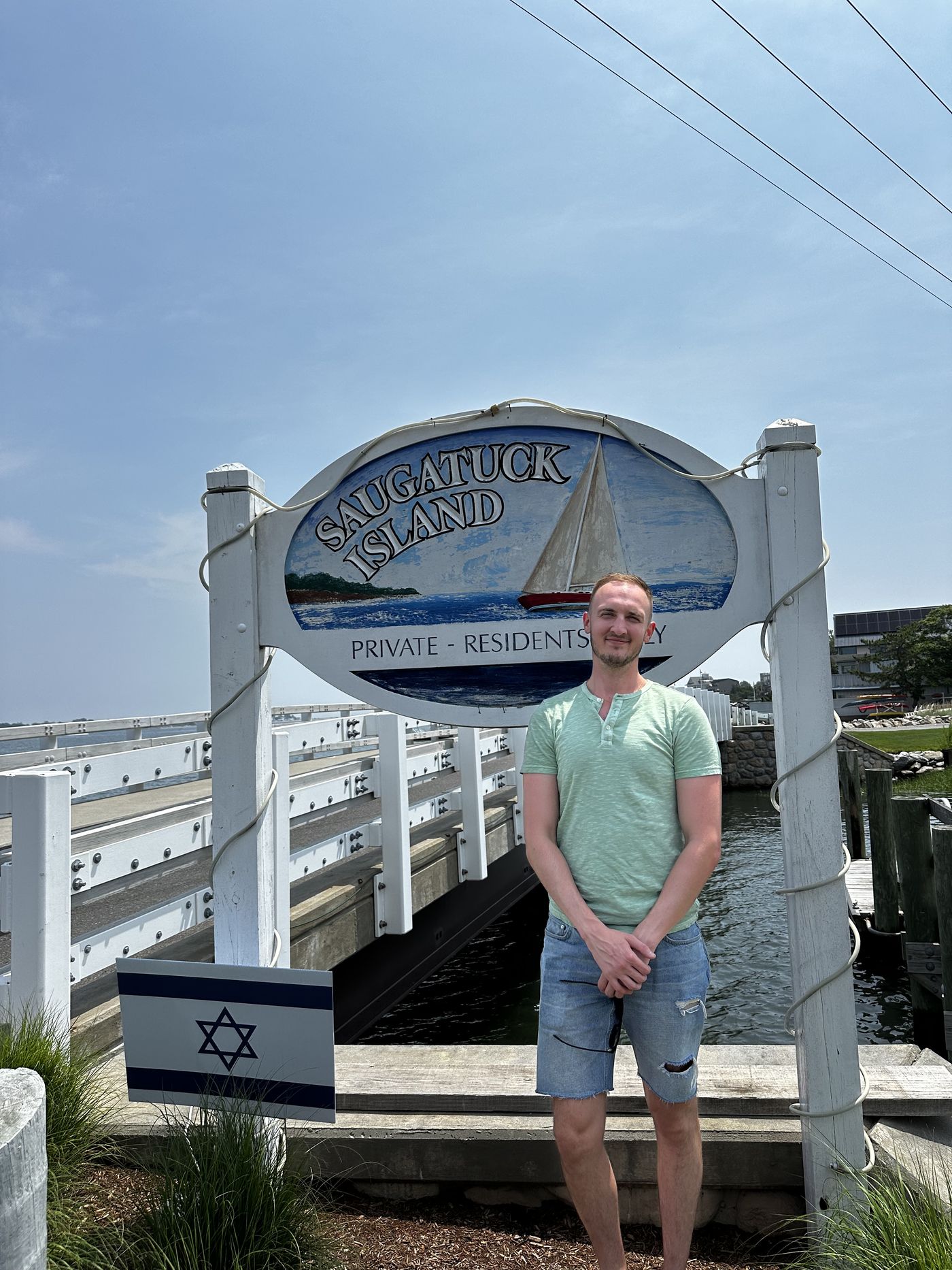 Dr. Strong at the Saugatuck Island sign, Westport, Connecticut