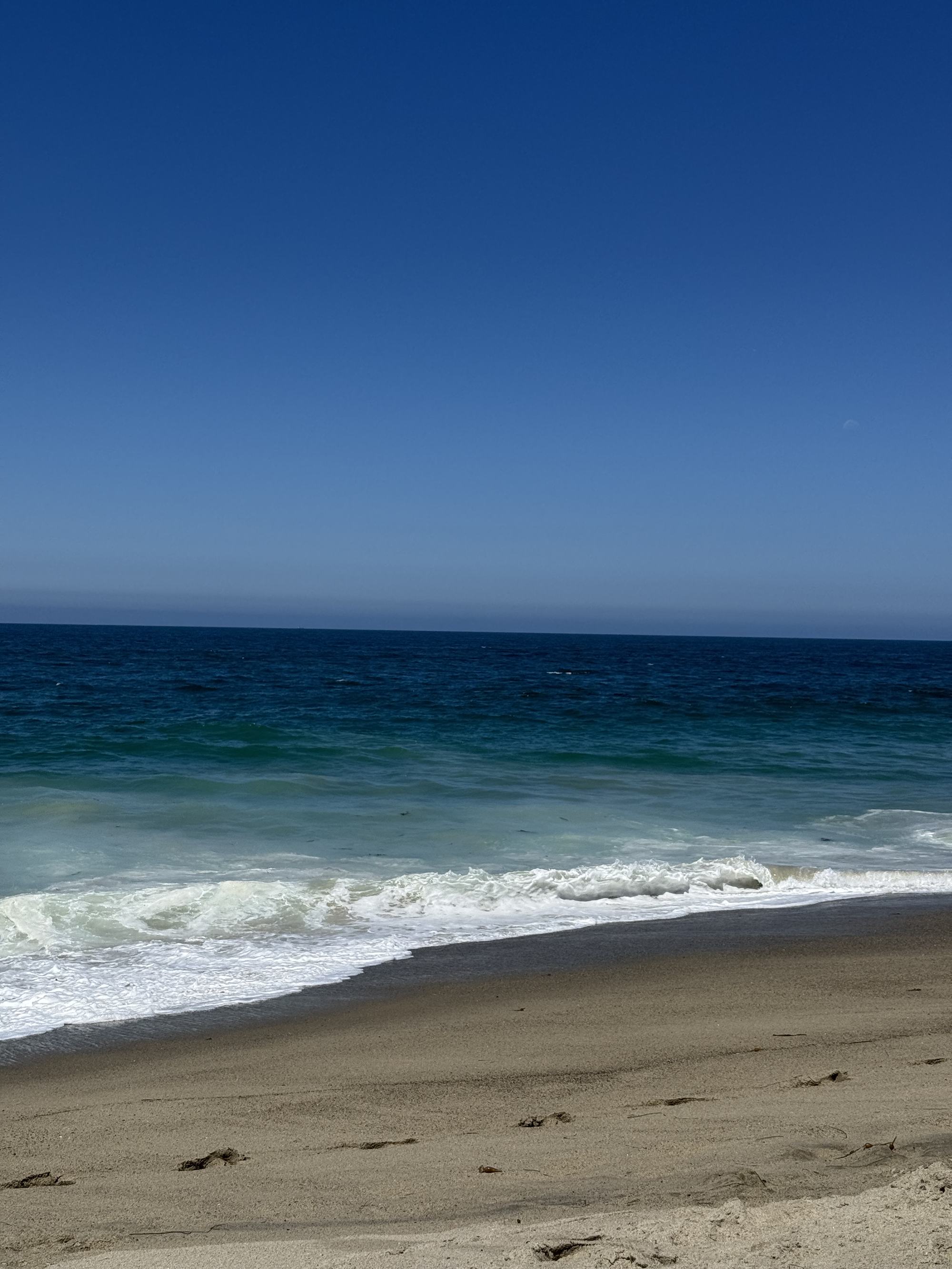 Deep blue ocean waves at the shoreline, Laguna Beach